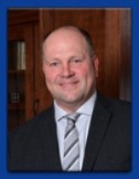 Headshot of Mark, bank president