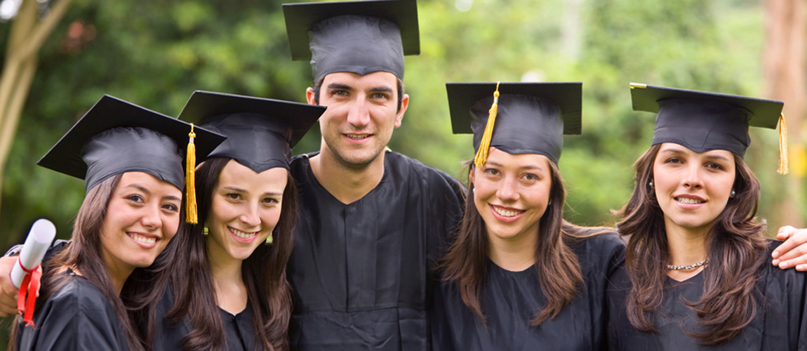 Group of students in graduation hats and gowns