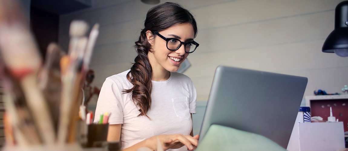 Young woman using laptop.