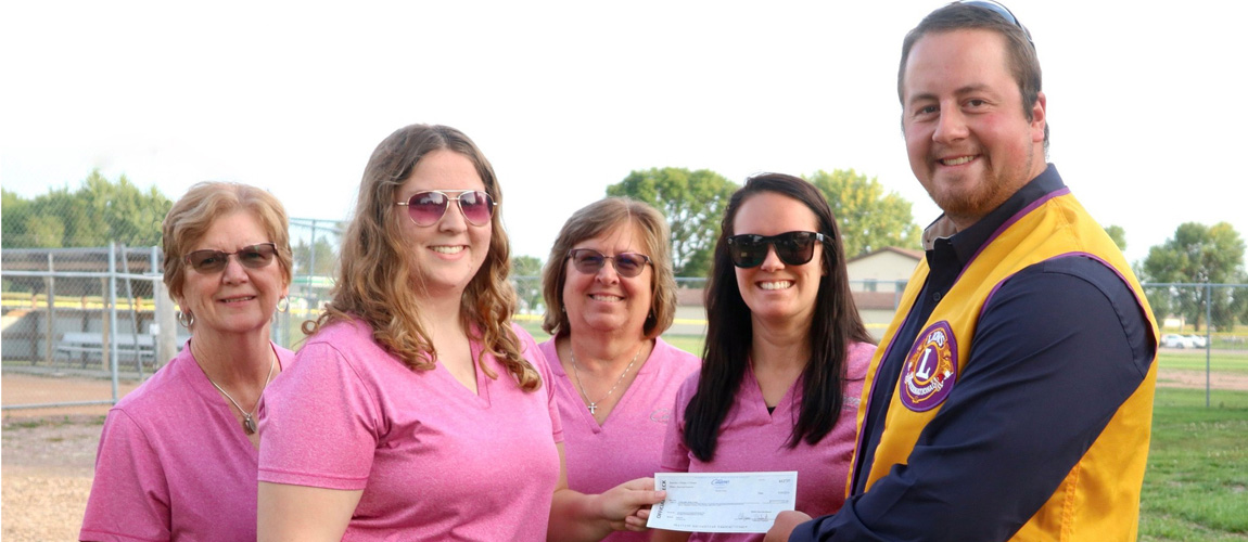 Lafayette staff giving check to Lafayette Lions