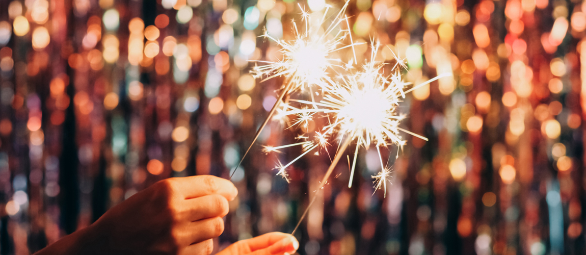 people holding sparklers