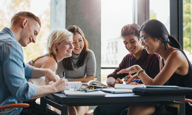 Students studying around a table