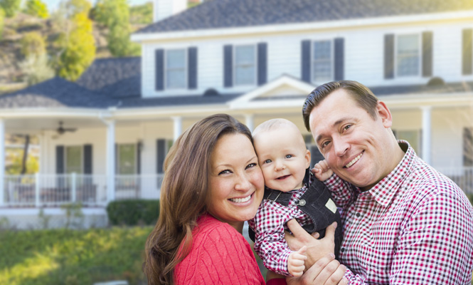 Family in front of their house