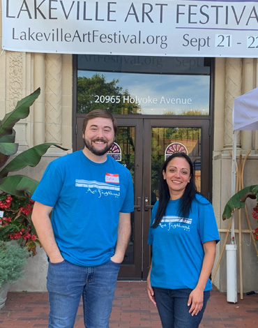 Colin and Kim volunteering at the Lakeville Art Festival
